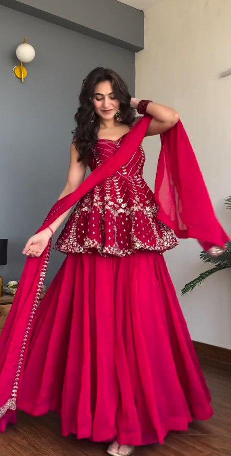 Heavily Embroidered Peplum Sharara Suit